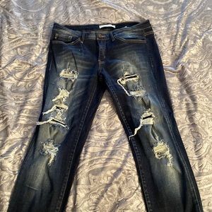 Dark blue Kancan skinny jeans that fade into a lighter shade of dark blue